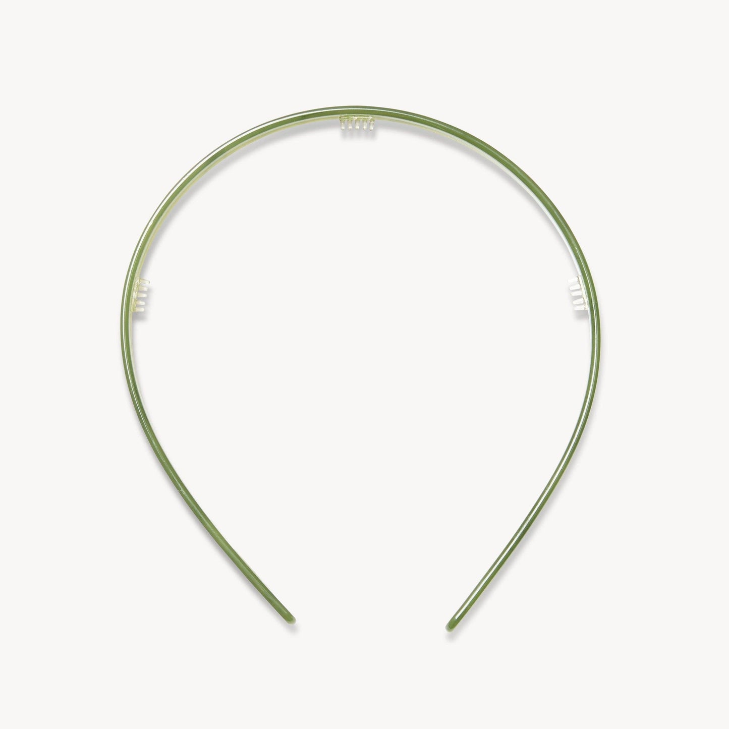 Green headband on a white background