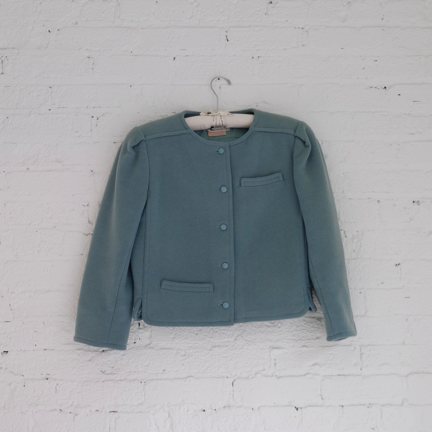 vintage 1970s courrages wool teal evening jacket with pockets and button closure