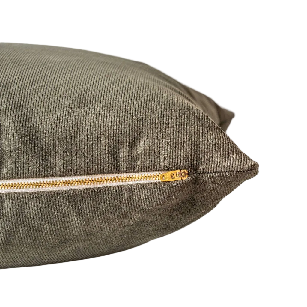 Green corduroy pillow cover with gold zipper