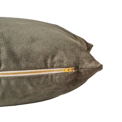 Green corduroy pillow cover with gold zipper