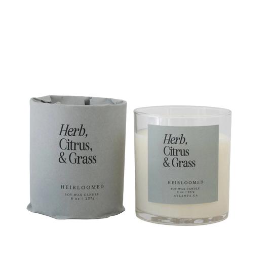 Herb, citrus, and grass scented candle by Heirloomed Candles with fresh, natural fragrance
