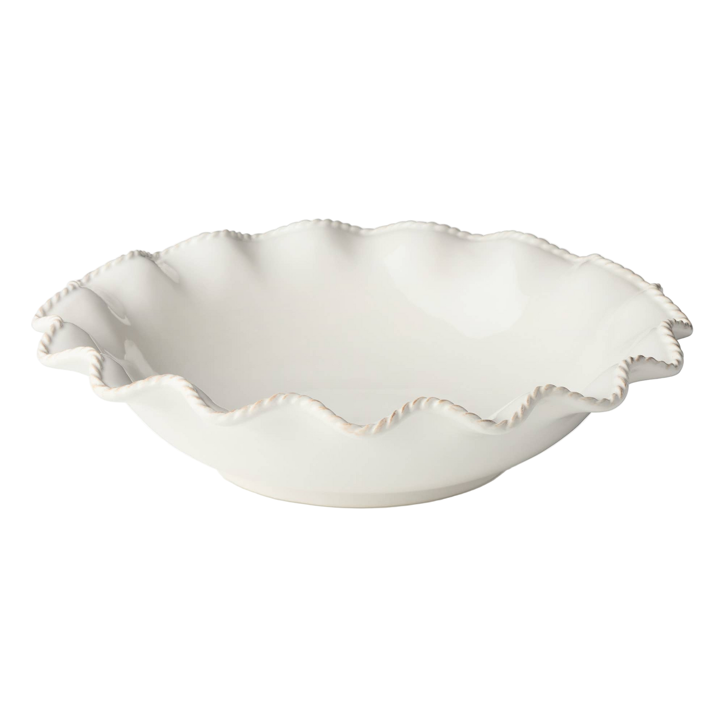 White ceramic bowl with scalloped edge and unique detail for serving or hosting