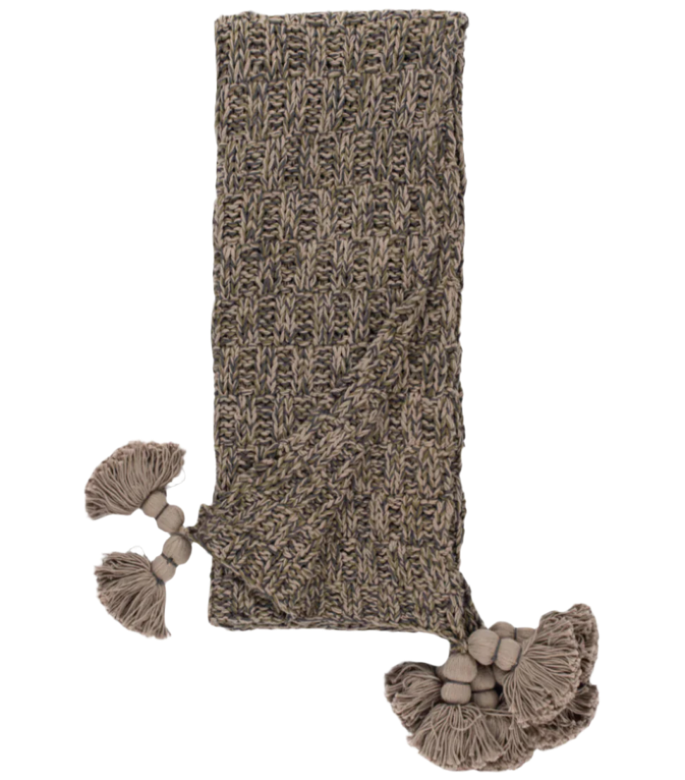 Jace Cypress Throw Blanket in warm cypress green with soft woven texture and fringe edges, perfect for adding cozy, stylish layering to sofas or beds.