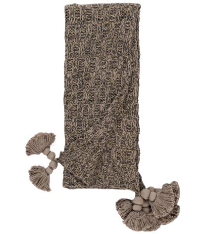 Jace Cypress Throw Blanket in warm cypress green with soft woven texture and fringe edges, perfect for adding cozy, stylish layering to sofas or beds.