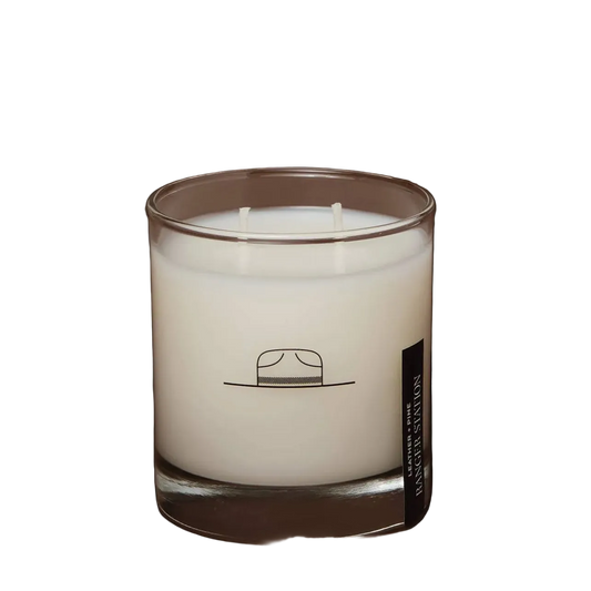 Leather and pine scented candle by Ranger Station with warm, woodsy fragrance