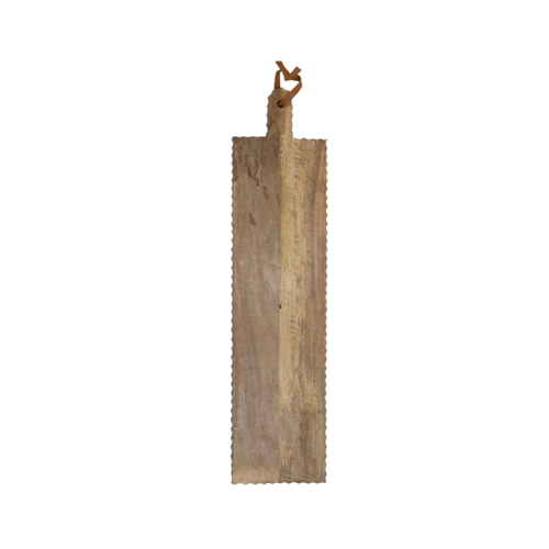 An oversized carved wooden cutting board with a loop for hanging and unique scalloped edges