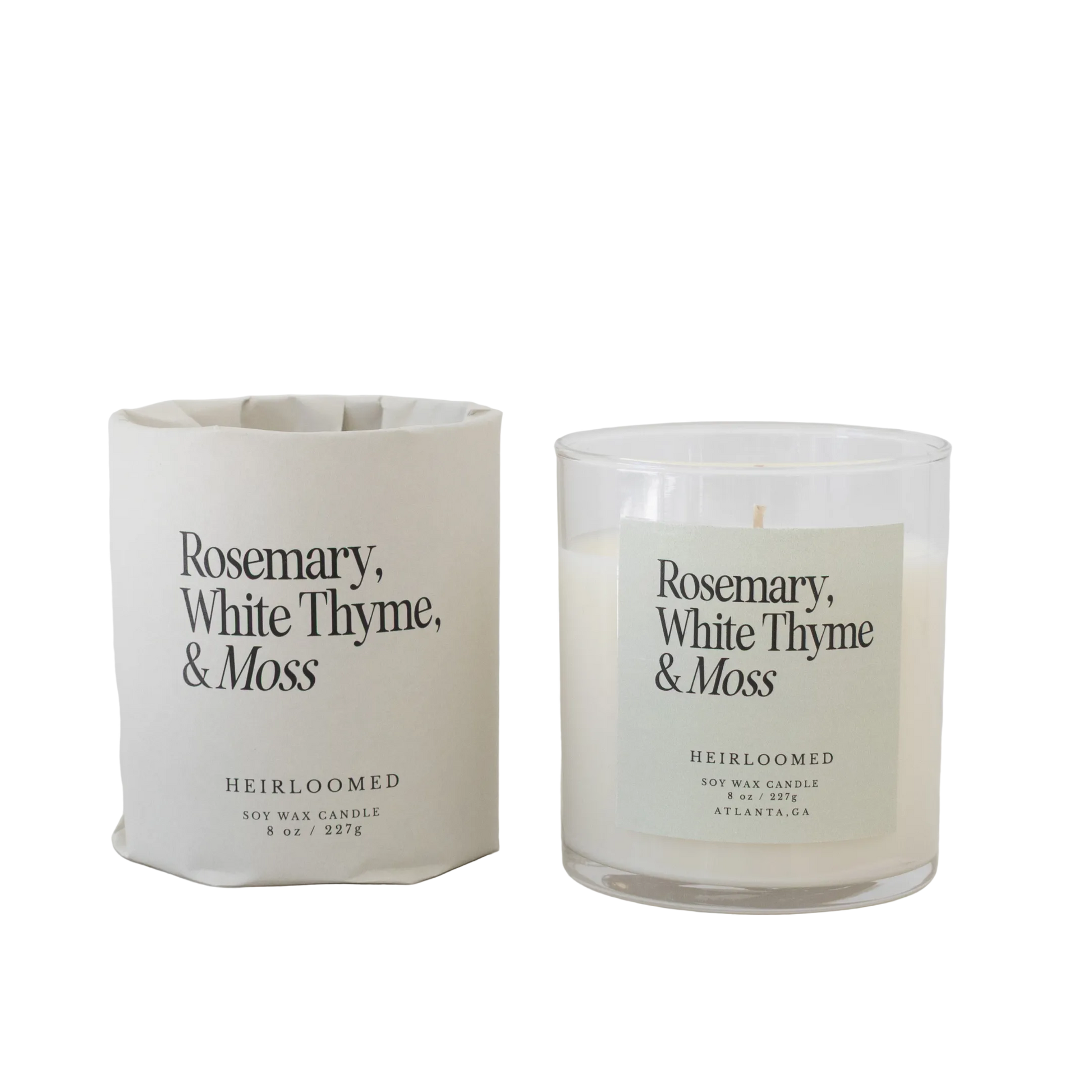 Heirloomed candle featuring earthy moss, aromatic rosemary, and subtle white thyme notes