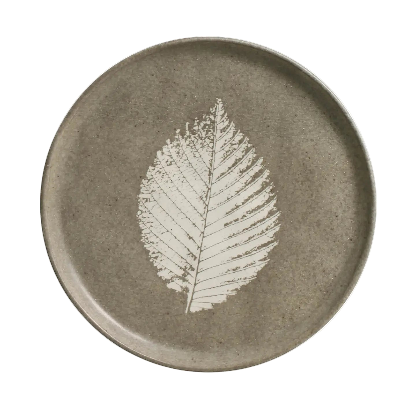 Seiva Dessert Plate is a round ceramic plate with a white leaf design on a beige background