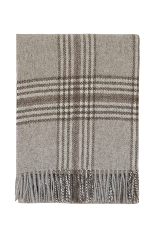 Stonehaven Throw in tan and dark taupe with soft woven texture and fringe edges, perfect for adding cozy, stylish layering to sofas or beds.