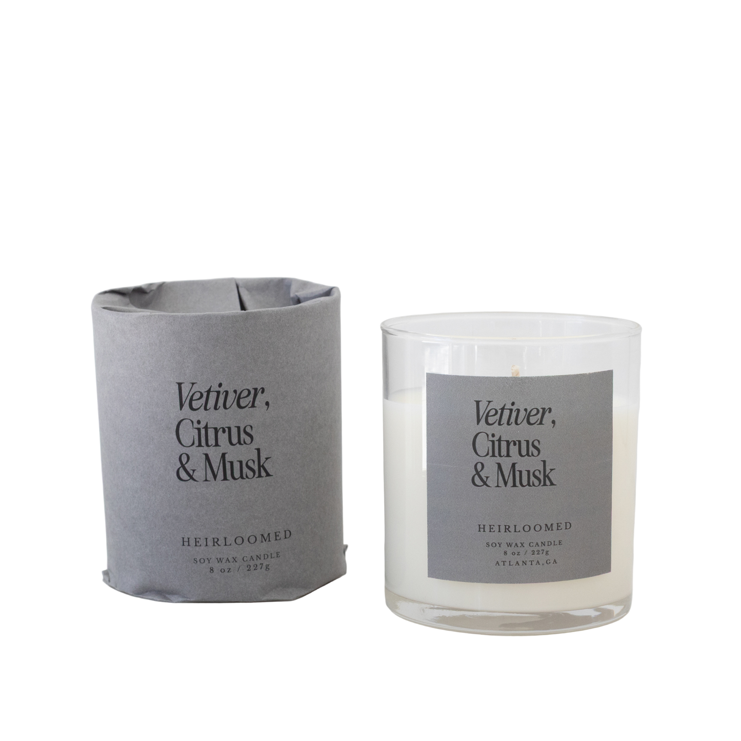 Heirloomed candle featuring bright citrus, grounding vetiver, and warm musk notes