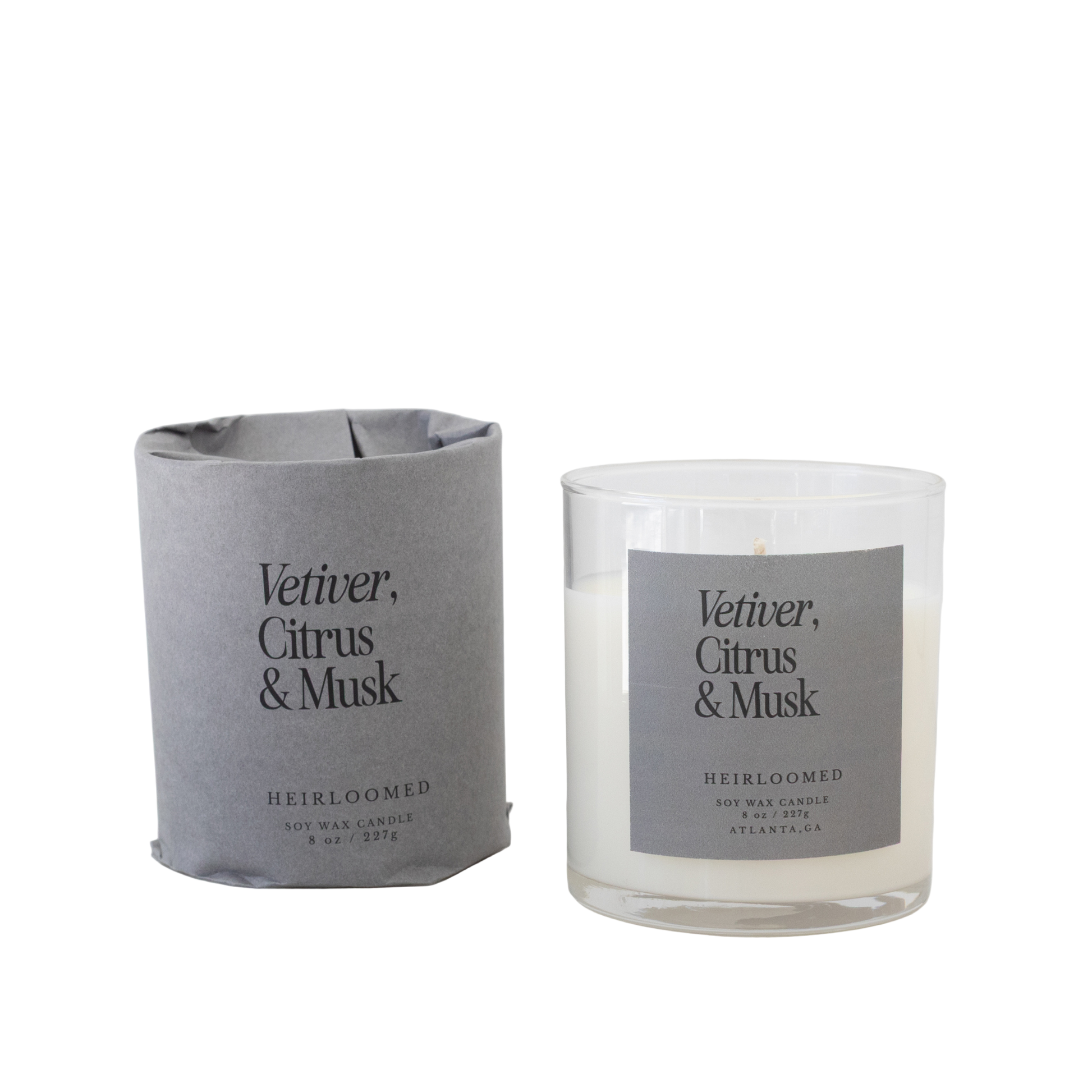 Heirloomed candle featuring bright citrus, grounding vetiver, and warm musk notes