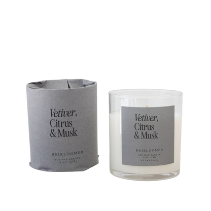 Heirloomed candle featuring bright citrus, grounding vetiver, and warm musk notes