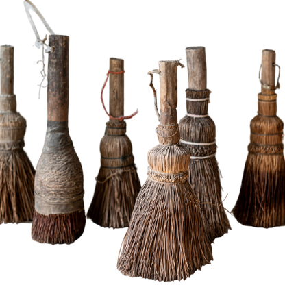 Traditional Chinese paint brush with worn handle and artisan craftsmanship