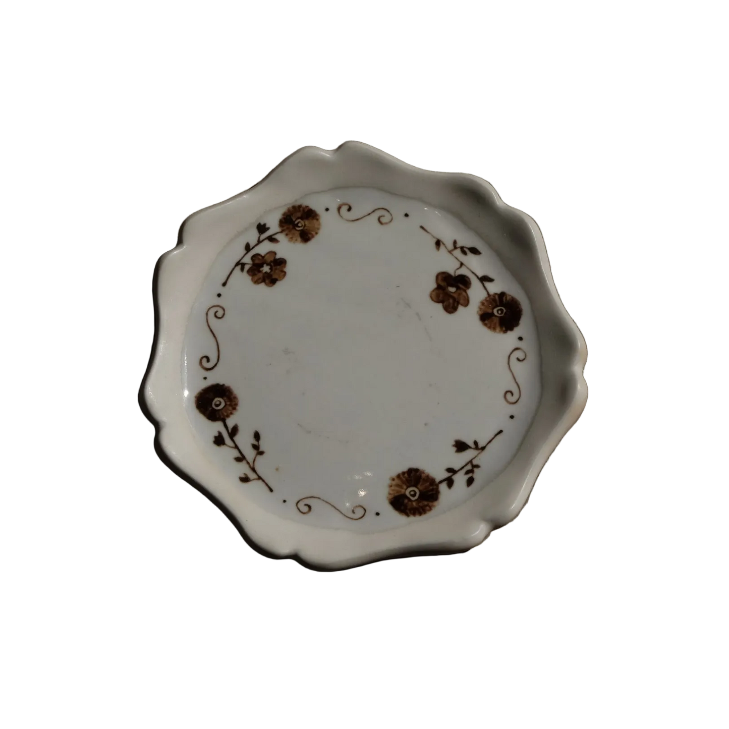 Stephanie Dawn Matthias ceramic dish with floral accents and unique rim