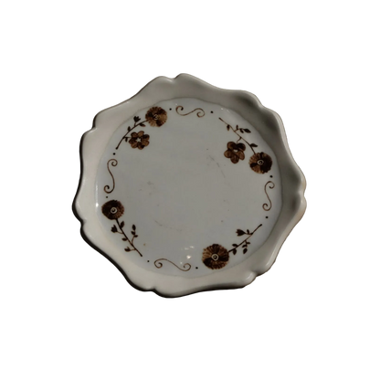 Stephanie Dawn Matthias ceramic dish with floral accents and unique rim