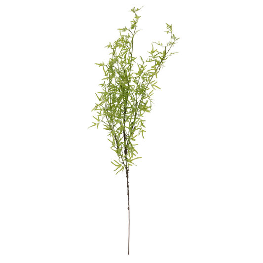 Artificial green plant branch on a white background