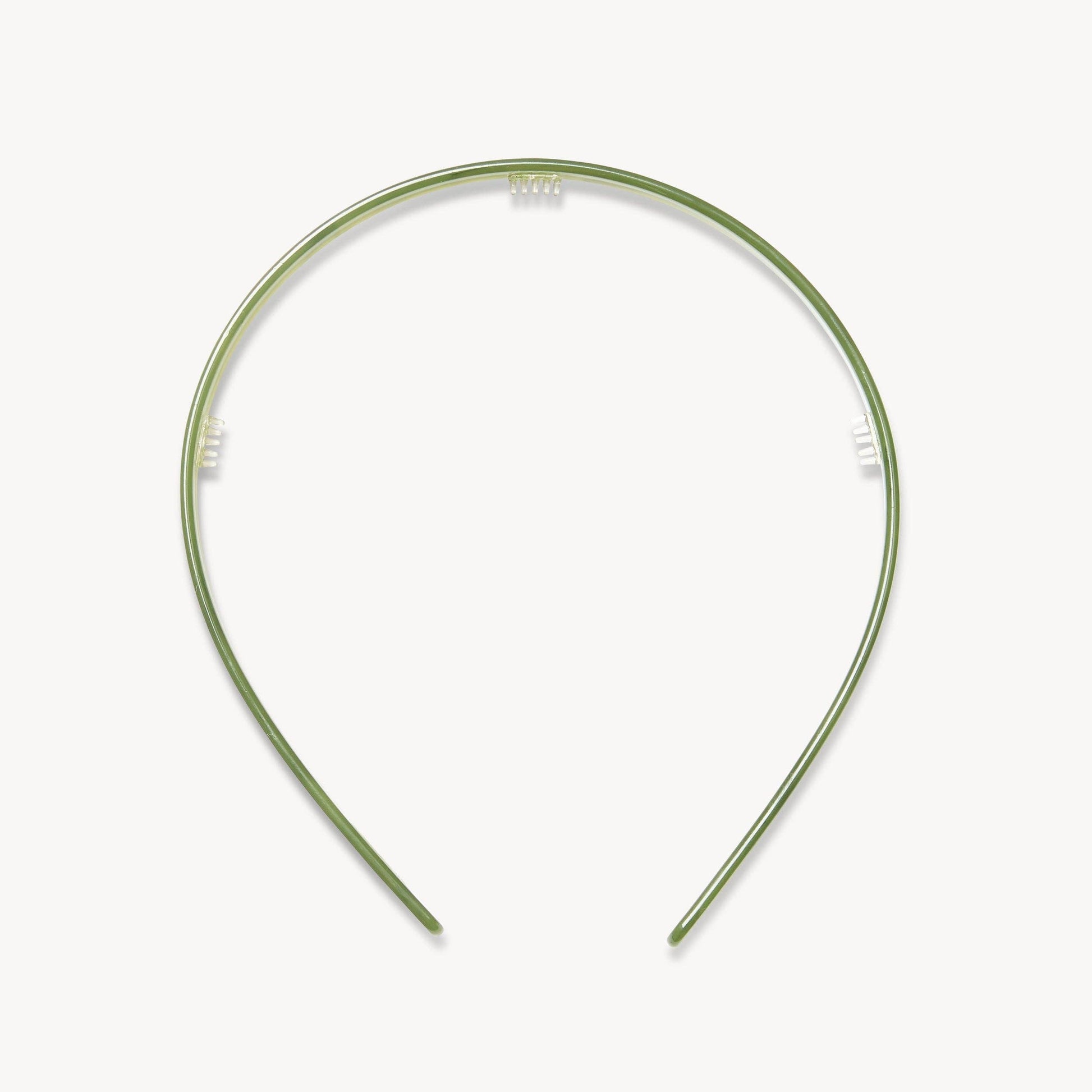 Green headband on a white background