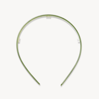 Green headband on a white background