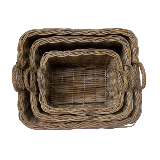 Three nested rectangular wicker baskets with side handles, shown from a top-down view on a plain white background.